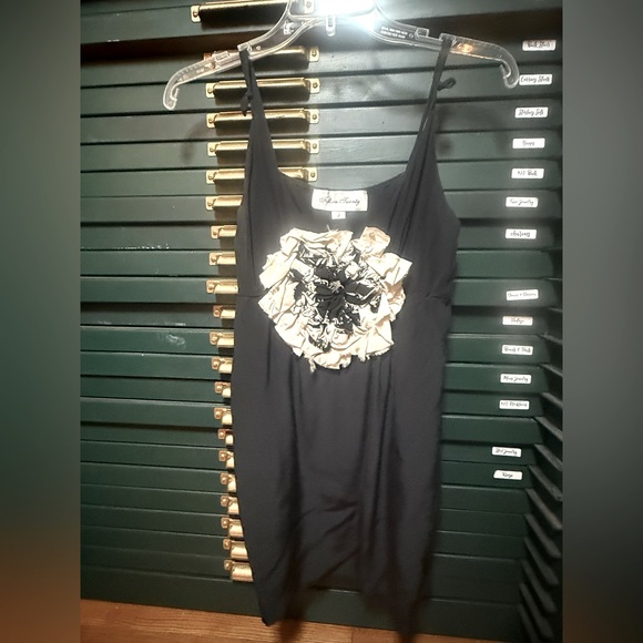 Fifteen-Twenty Black Babydoll Silk Spaghetti strap blouse with lg fluffy flower